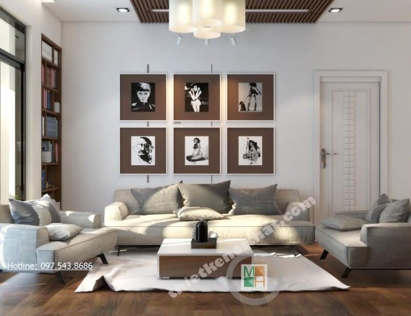 Không còn là những mảng tường đơn sắc thiếu tinh tế, kiến trúc sư lựa chọn trang trí thêm bằng những bức tranh treo tường nghệ thuật đầy lạ mắt